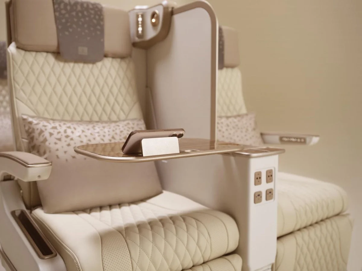 Introducing-Emirates'-world&rsquo;s-first-electric-Premium-Economy-seat-with-full-height-privacy-screen-phone-holder