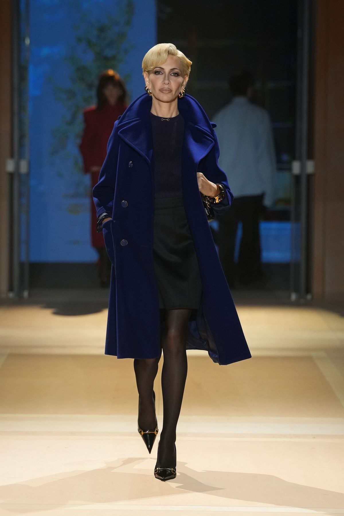 Gucci trình diễn Xuân–Hè 2027 trong không gian mô phỏng cửa hàng tại Milan. Ảnh: Alessandro Lucioni
